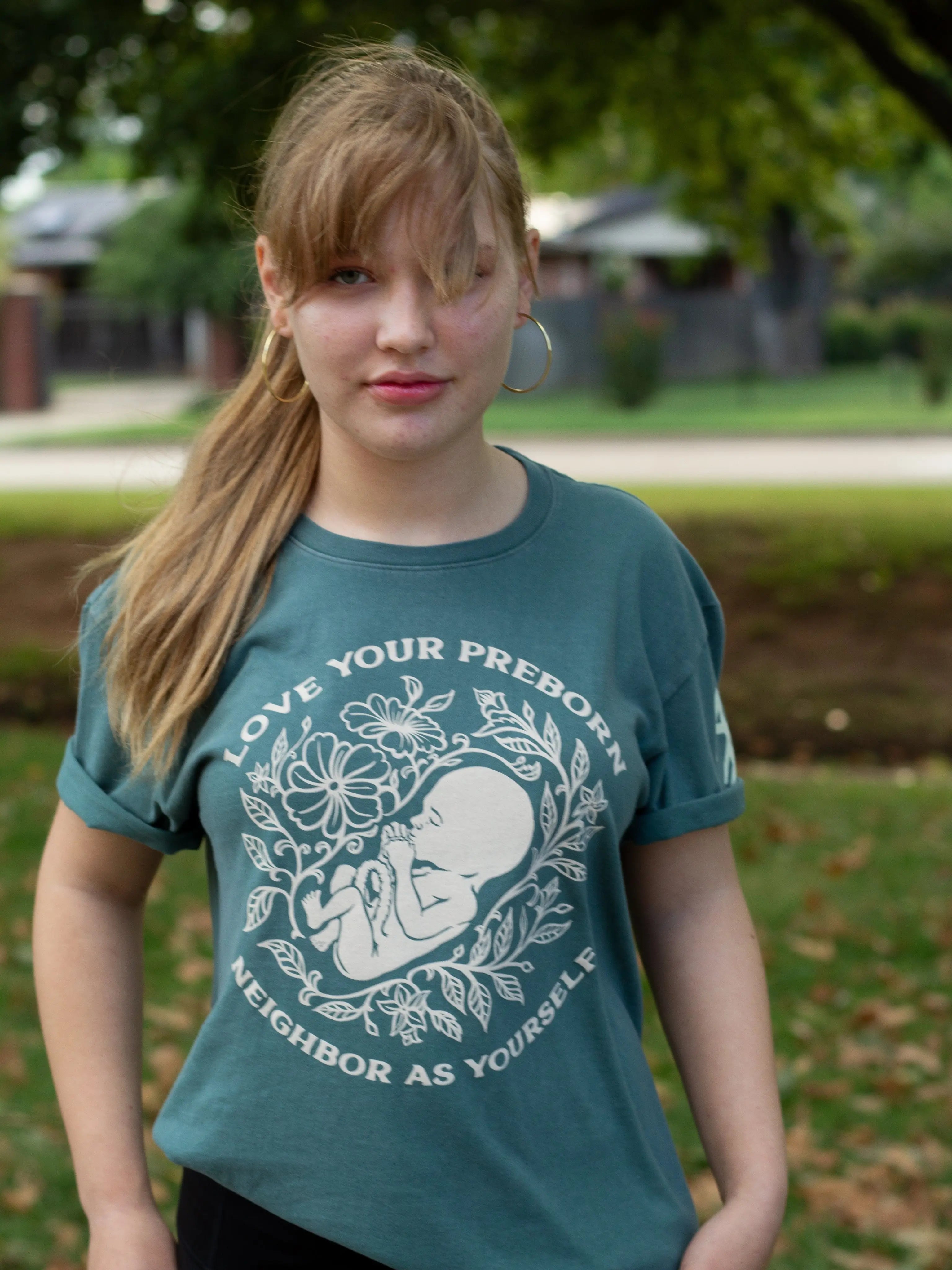 Love Your Pre-Born Neighbors Nordic Green Unisex T-Shirt Abolitionists Rising Store