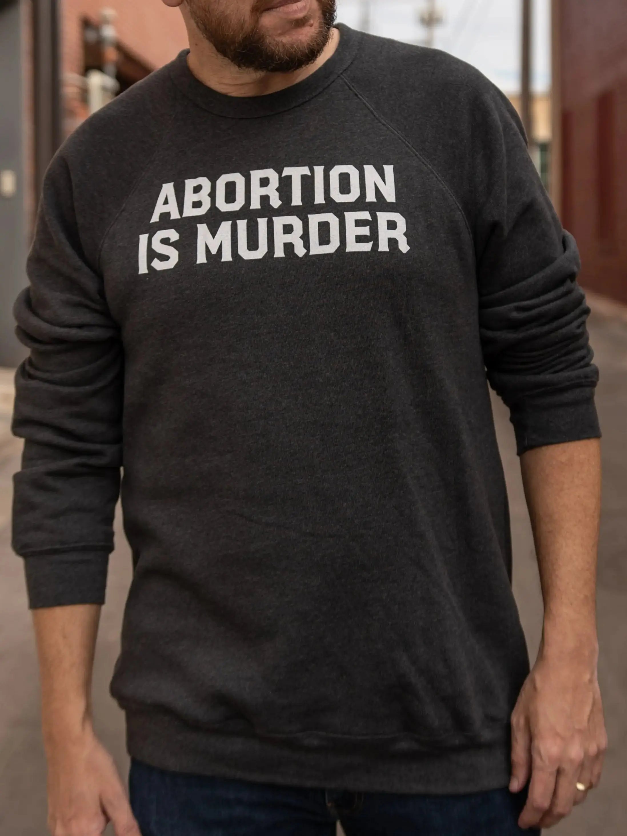 Abortion Is Murder Unisex Sweatshirt Abolitionists Rising Gear Store