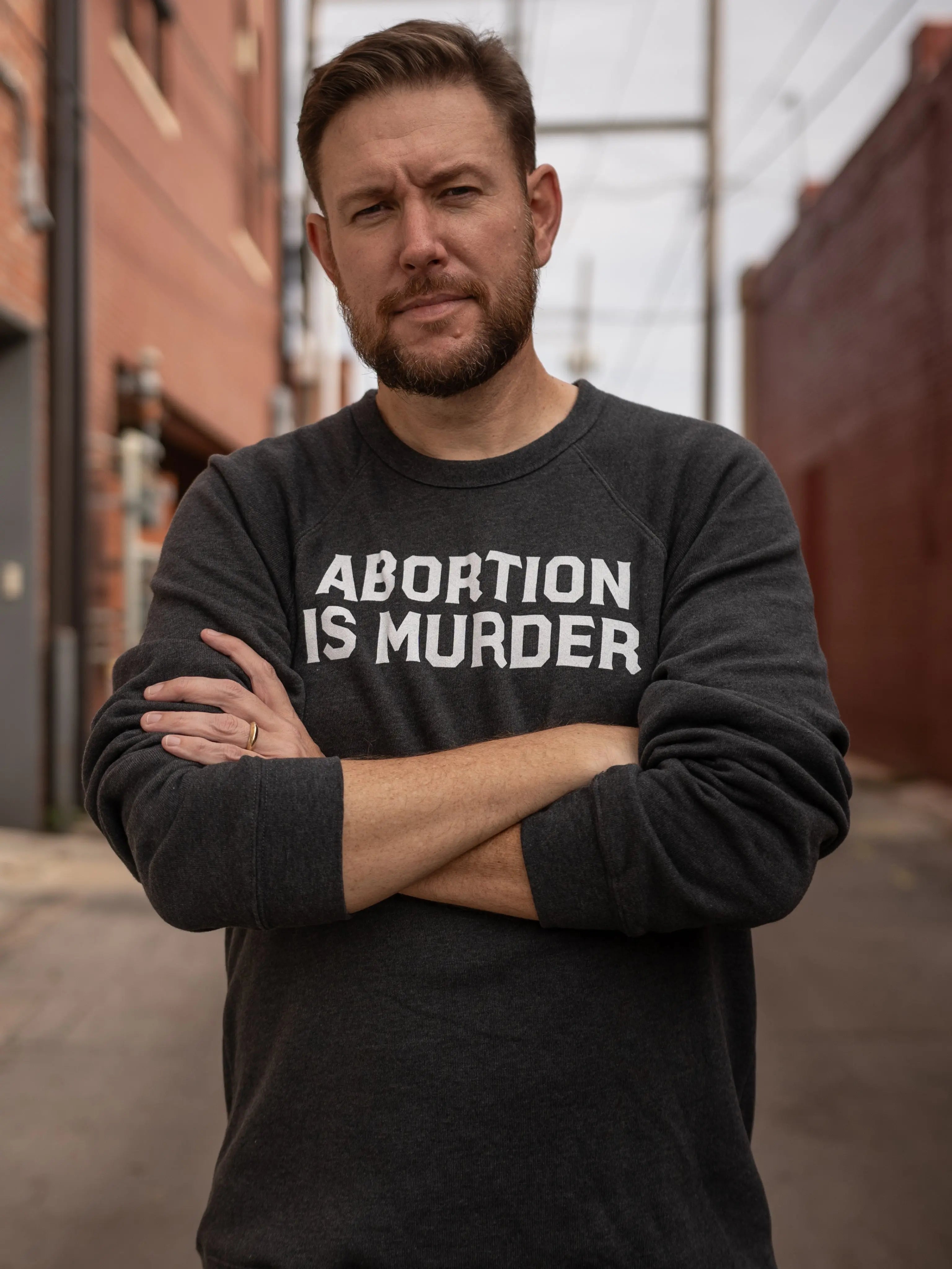 Abortion Is Murder Unisex Sweatshirt Abolitionists Rising Gear Store