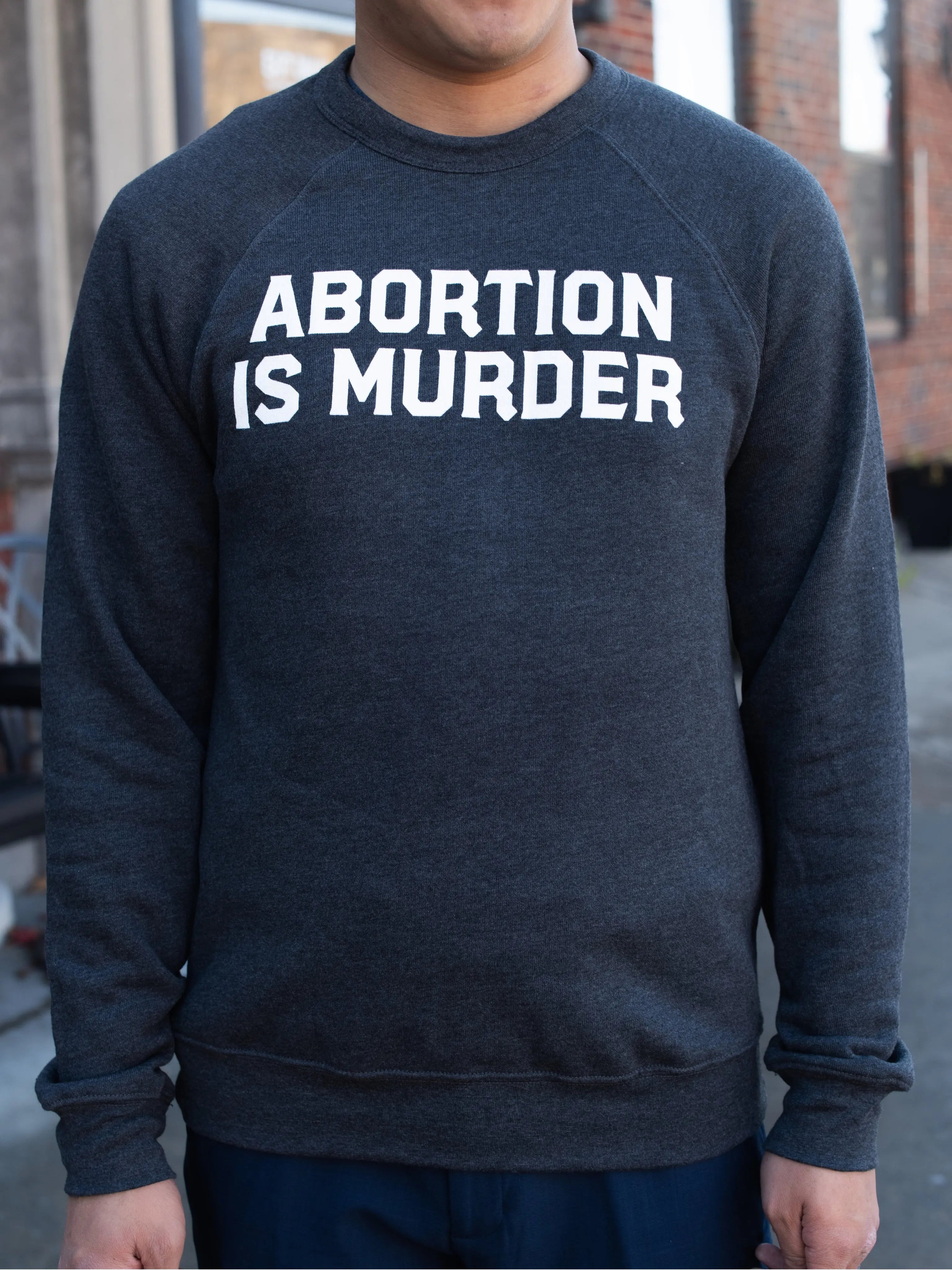 Abortion Is Murder Unisex Sweatshirt Abolitionists Rising Gear Store