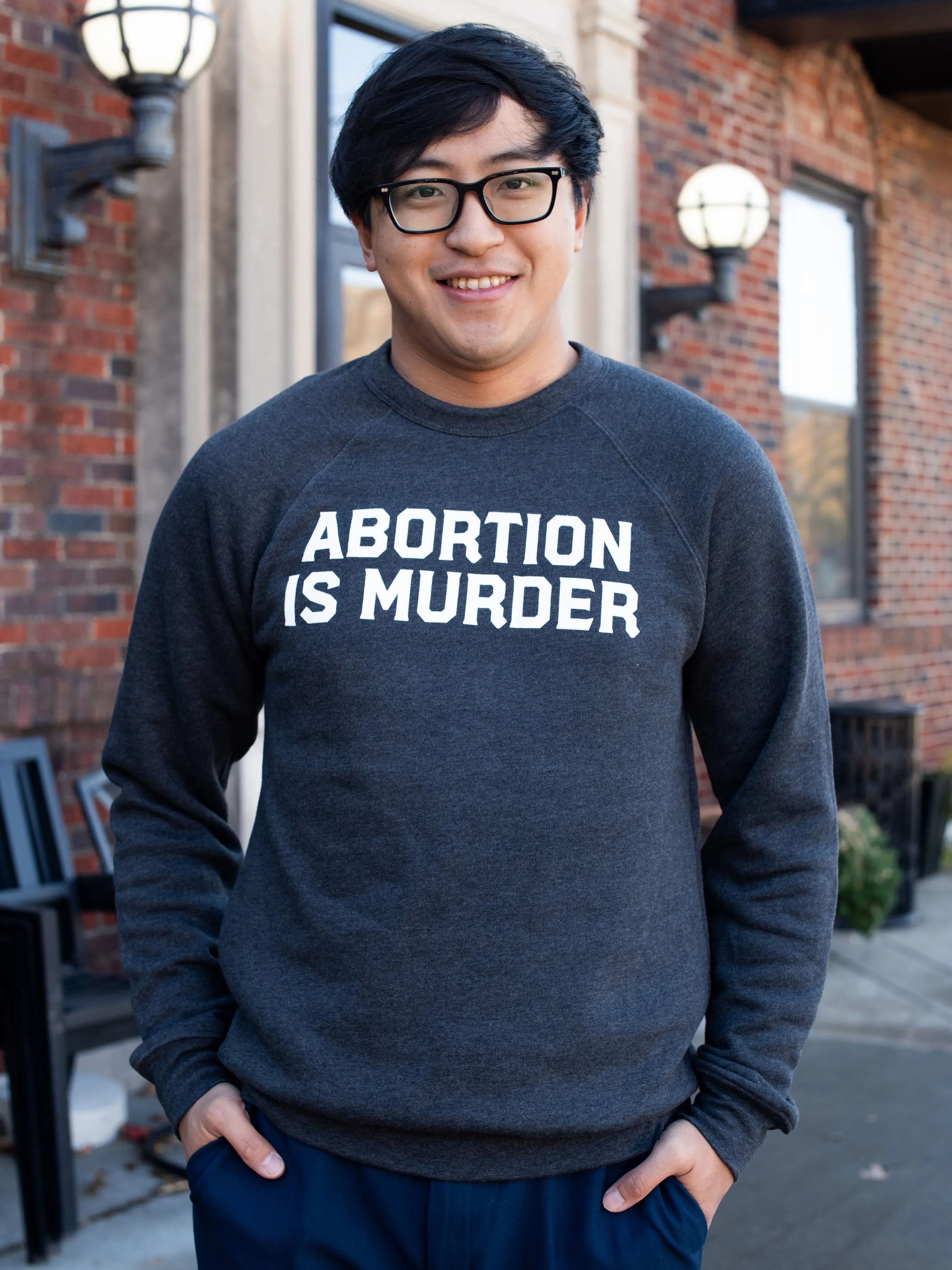 Abortion Is Murder Unisex Sweatshirt Abolitionists Rising Gear Store