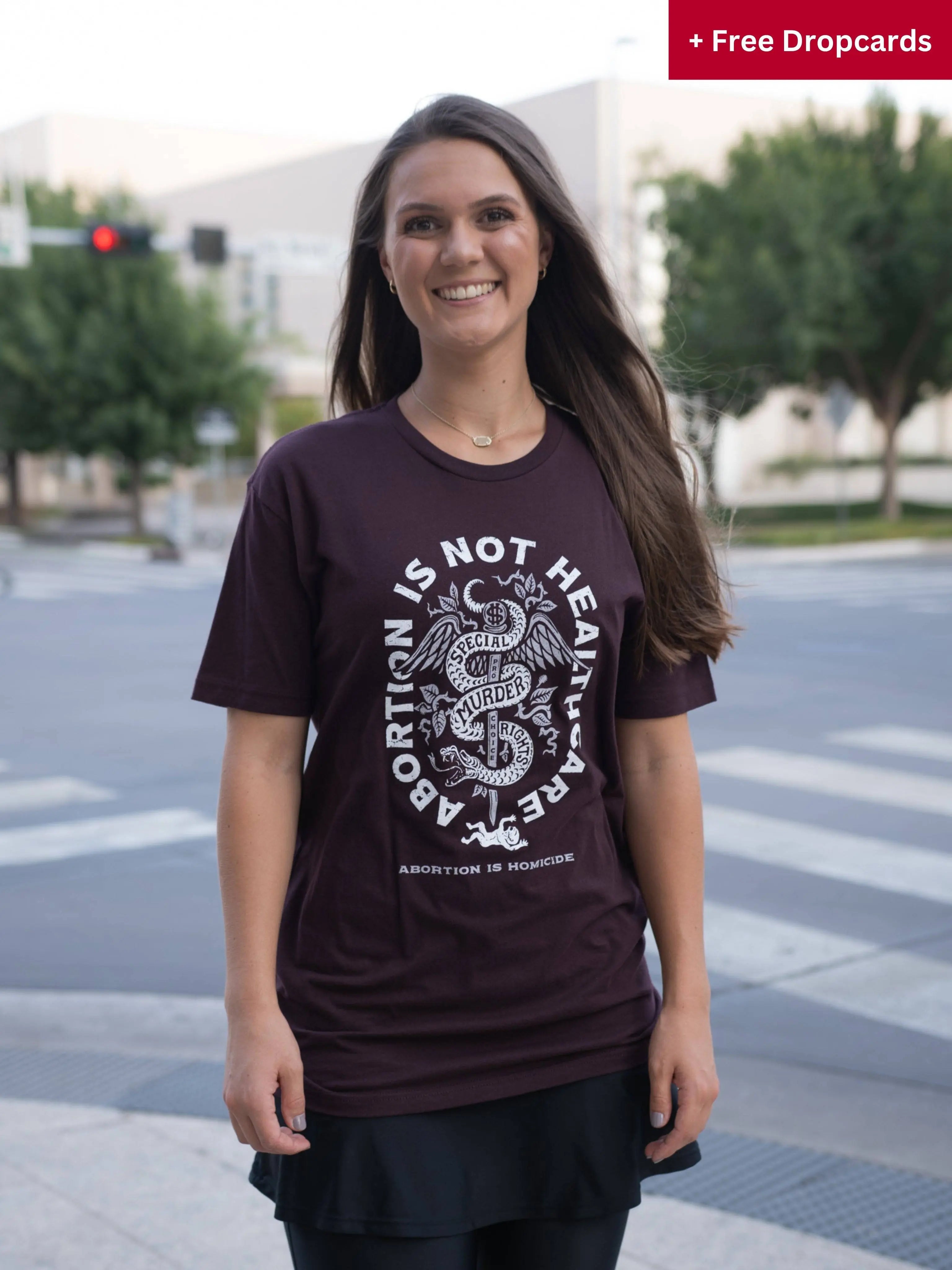 Abortion Is Not Healthcare T-Shirt (Unisex) Oxblood & Dropcard Bundle - Abolitionists Rising Gear Store