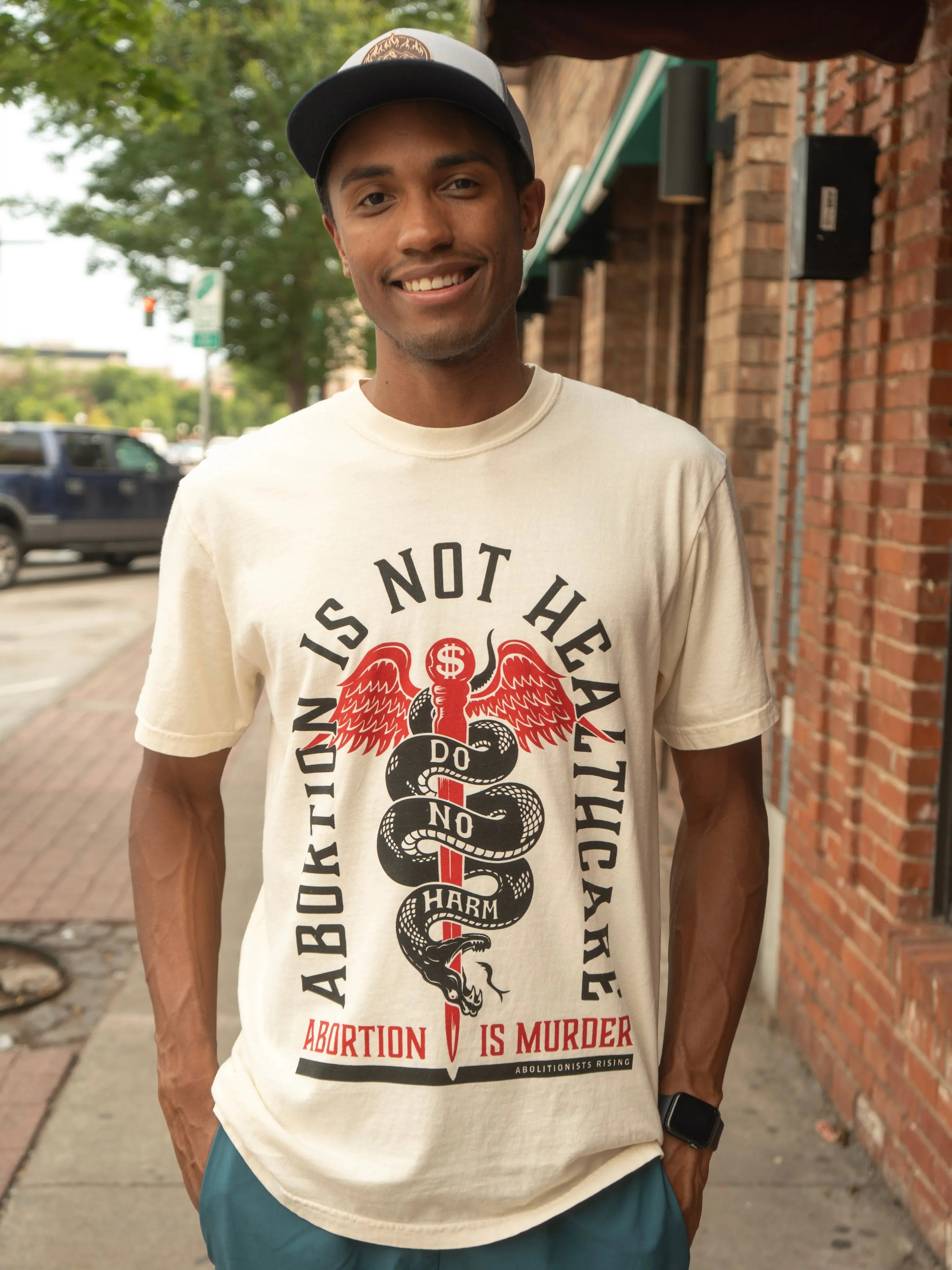 Abortion is not Healthcare Unisex T-Shirt Abolitionists Rising Store 