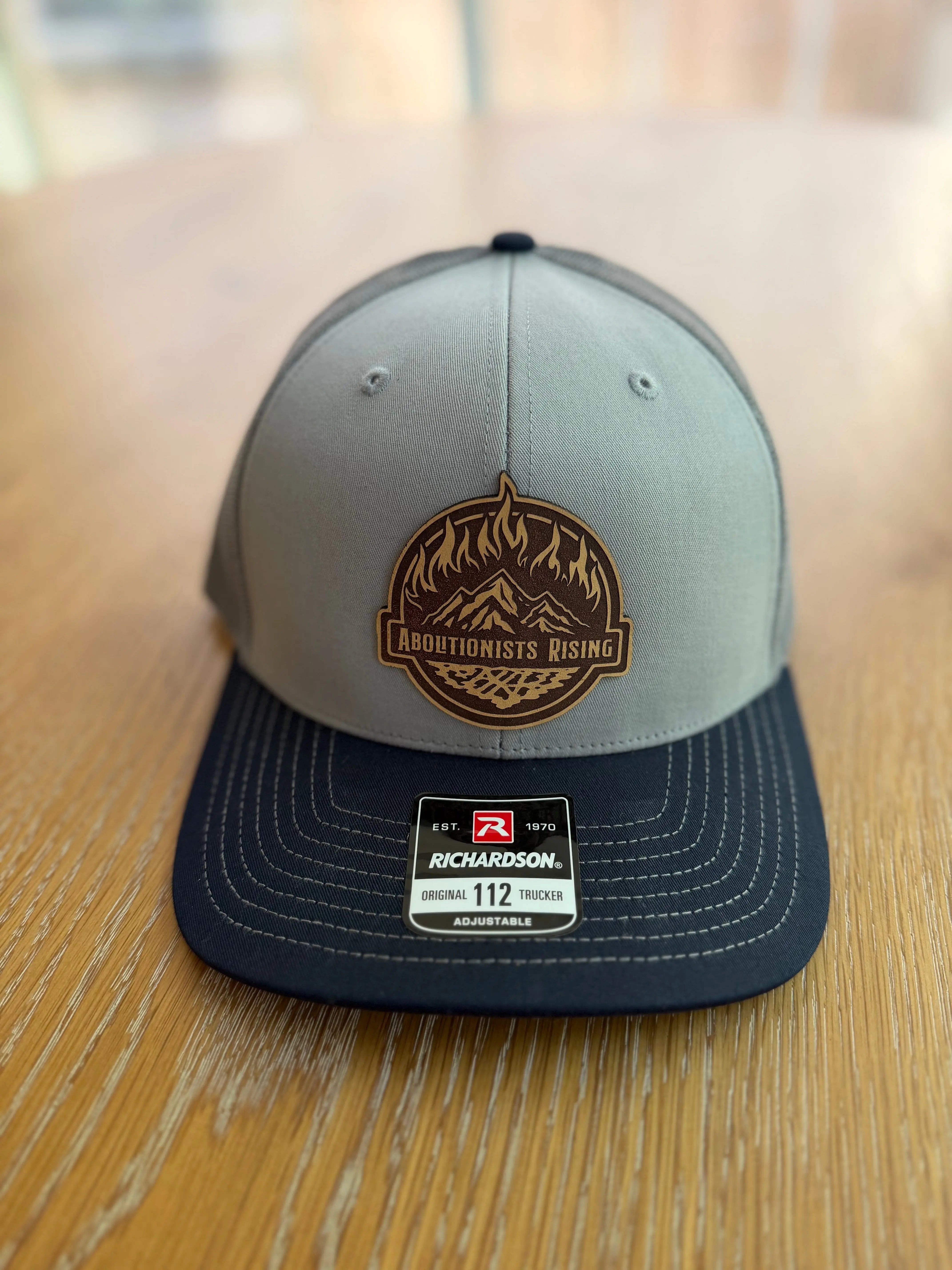 Abolitionists Rising Navy/ Charcoal Leather Patch Hat Abolitionists Rising Gear Store 